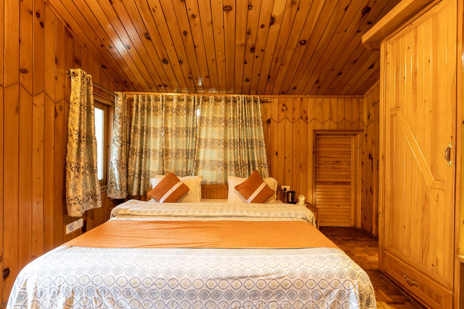 Magnolia D sun-drenched valley view bedroom at The Hive Cottage Nainital